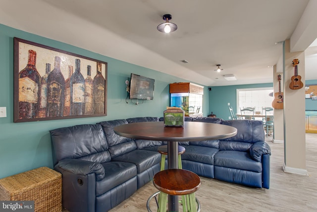 12133 Neale Sound Dr, Cobb Island, MD 20625 - living area with wood finished floors and baseboards