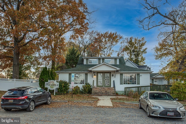 12133 Neale Sound Dr, Cobb Island, MD 20625 - view of front facade featuring roof with shingles and french doors