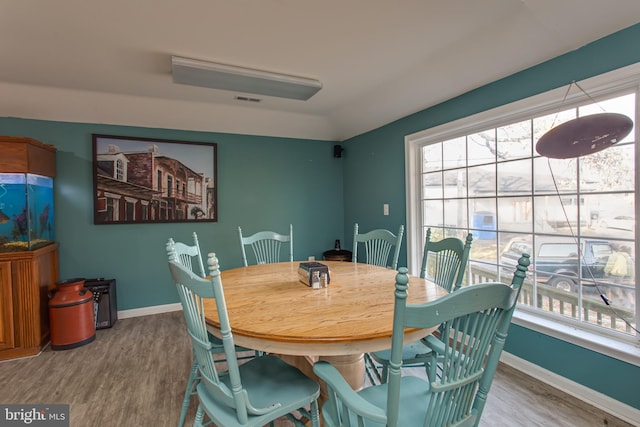 12133 Neale Sound Dr, Cobb Island, MD 20625 - dining area featuring wood finished floors and baseboards