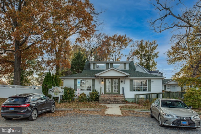 12133 Neale Sound Dr, Cobb Island, MD 20625 - view of front of house featuring a shingled roof and french doors