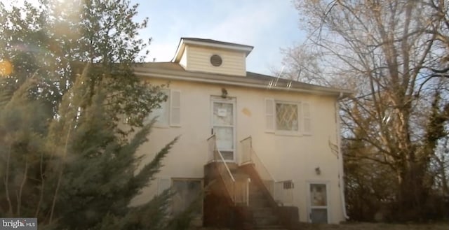 510 62nd Ave, Capitol Heights, MD 20743 - view of property exterior with stucco siding and stairs