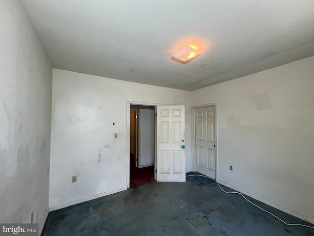 510 62nd Ave, Capitol Heights, MD 20743 - spare room with unfinished concrete flooring and baseboards