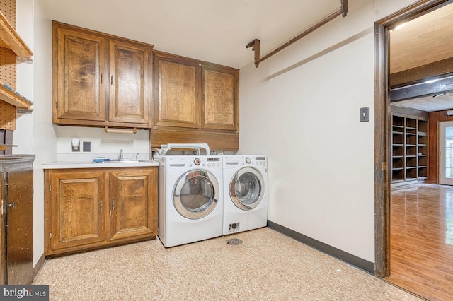 7423 Round Hill Rd, Frederick, MD 21702 - laundry room featuring cabinet space, washer and dryer, and baseboards
