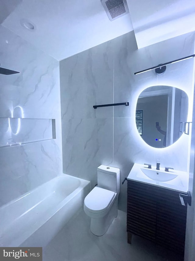 2007 S Joyce St, Arlington, VA 22202 - full bath with toilet, vanity, tile walls, and  shower combination