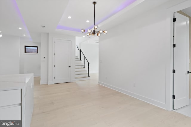 2007 S Joyce St, Arlington, VA 22202 - unfurnished dining area with recessed lighting, a chandelier, stairs, baseboards, and a raised ceiling
