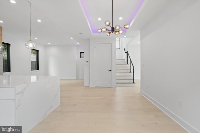2007 S Joyce St, Arlington, VA 22202 - hall with recessed lighting, stairs, light wood-style flooring, a chandelier, and baseboards