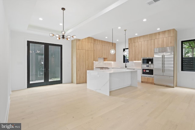 2007 S Joyce St, Arlington, VA 22202 - kitchen with built in appliances, modern cabinets, light wood finished floors, and recessed lighting