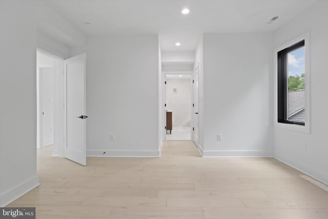 2007 S Joyce St, Arlington, VA 22202 - spare room featuring light wood-type flooring, recessed lighting, and baseboards