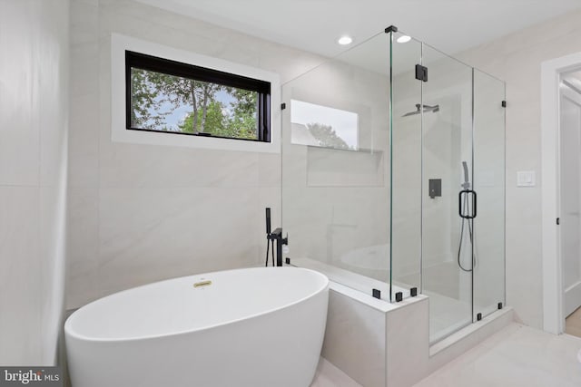 2007 S Joyce St, Arlington, VA 22202 - bathroom with a freestanding tub and a shower stall