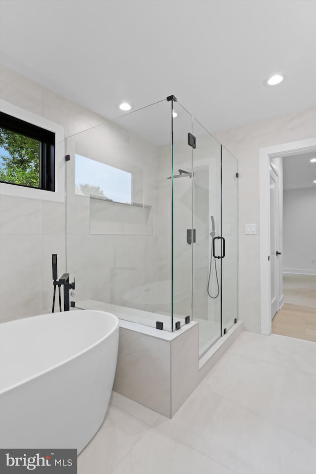 2007 S Joyce St, Arlington, VA 22202 - full bathroom featuring a freestanding bath, a stall shower, and recessed lighting