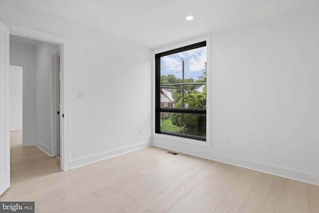 2007 S Joyce St, Arlington, VA 22202 - spare room featuring light wood-style flooring, recessed lighting, and baseboards