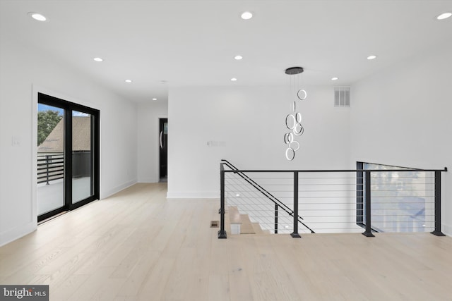 2007 S Joyce St, Arlington, VA 22202 - unfurnished room with recessed lighting, light wood-style floors, and baseboards