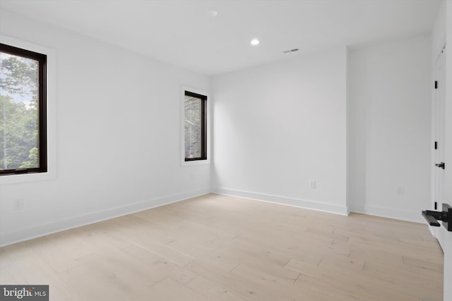 2007 S Joyce St, Arlington, VA 22202 - empty room featuring recessed lighting, light wood-style flooring, and baseboards