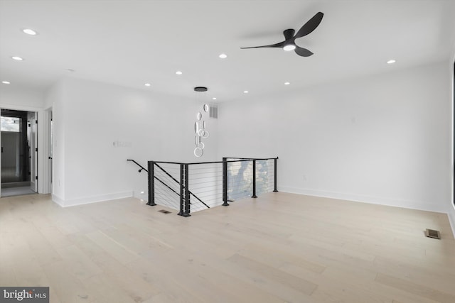 2007 S Joyce St, Arlington, VA 22202 - unfurnished room with recessed lighting, light wood finished floors, baseboards, and a ceiling fan
