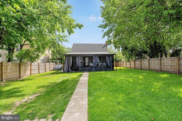 4406 Furley Ave, Baltimore, MD 21206 - rear view of house with a sunroom and a shingled roof