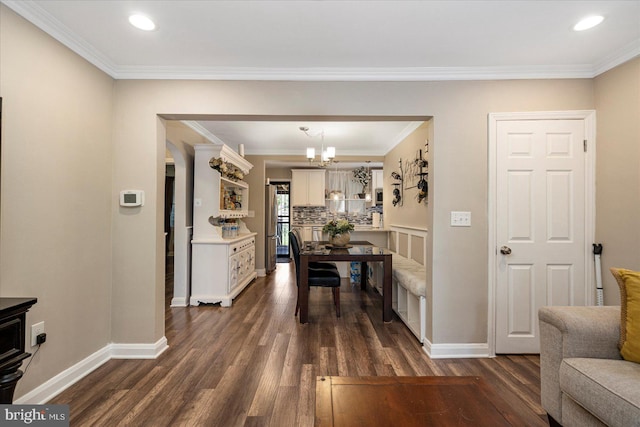 4406 Furley Ave, Baltimore, MD 21206 - dining space featuring dark wood-style flooring, baseboards, ornamental molding, a chandelier, and recessed lighting