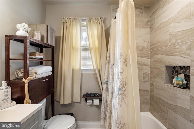 4406 Furley Ave, Baltimore, MD 21206 - full bathroom with healthy amount of natural light, vanity, toilet, and shower / bath combo with shower curtain