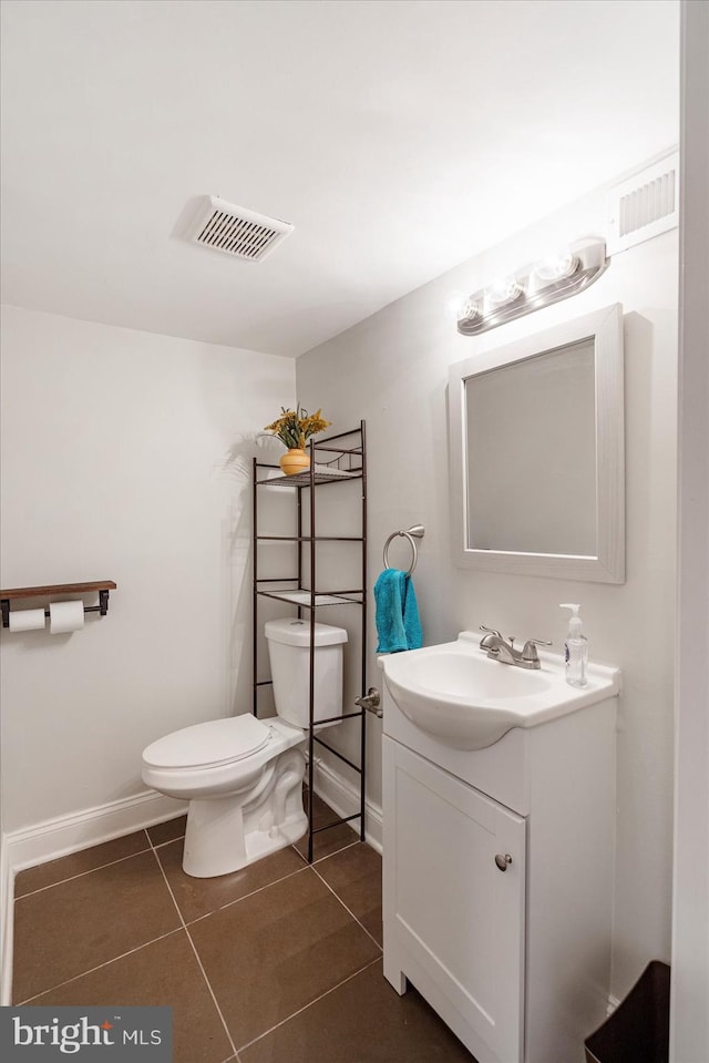 4406 Furley Ave, Baltimore, MD 21206 - half bath with toilet, vanity, tile patterned floors, and baseboards