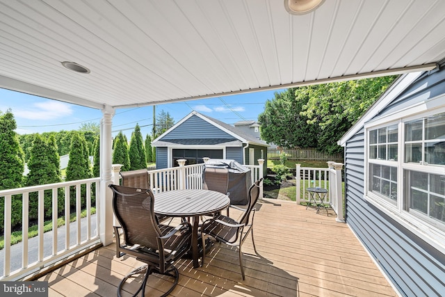 428 Hampshire Dr, Broomall, PA 19008 - deck with outdoor dining space and an outdoor structure