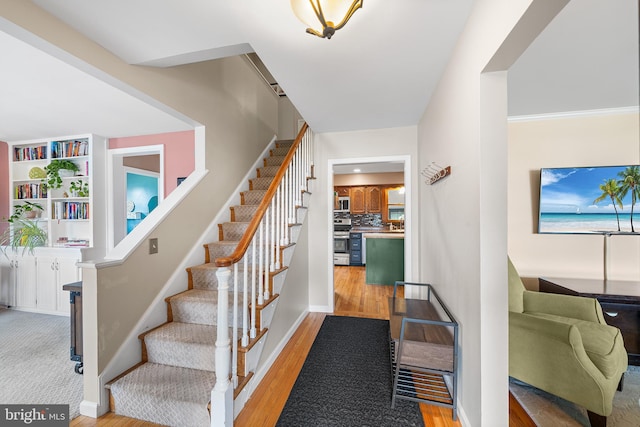 428 Hampshire Dr, Broomall, PA 19008 - staircase with wood finished floors and baseboards
