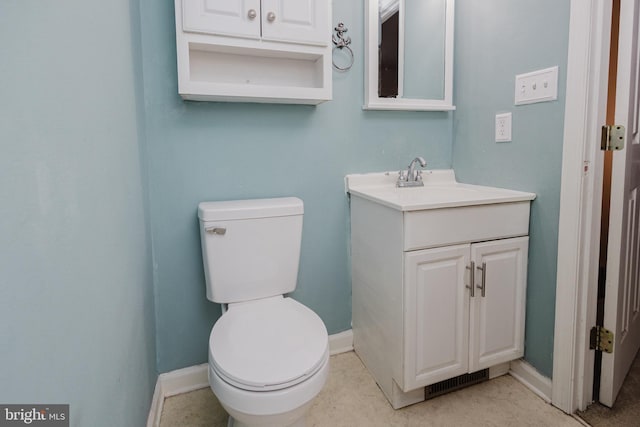 103 Stadium Cir, Inwood, WV 25428 - bathroom featuring vanity, toilet, and baseboards