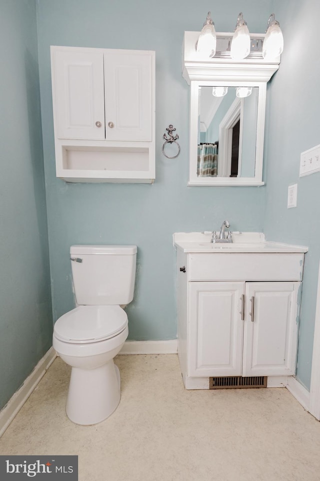 103 Stadium Cir, Inwood, WV 25428 - full bath featuring baseboards, vanity, and toilet