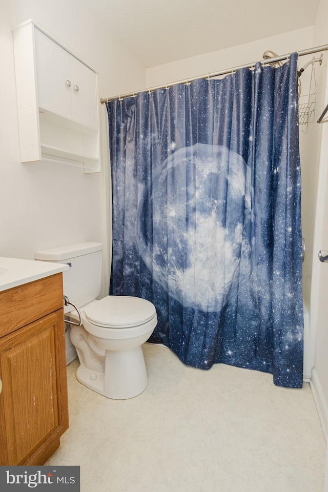 103 Stadium Cir, Inwood, WV 25428 - bathroom featuring toilet, vanity, and a shower with shower curtain