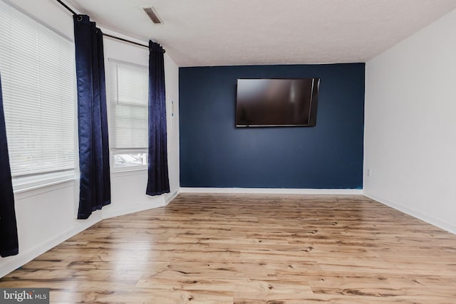 103 Stadium Cir, Inwood, WV 25428 - spare room with wood finished floors and baseboards