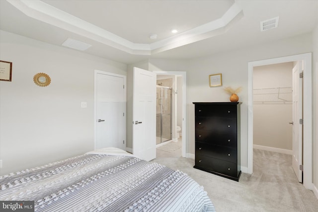 118 Fletcher Cir, Middletown, DE 19709 - bedroom featuring a spacious closet, a raised ceiling, light colored carpet, a closet, and baseboards