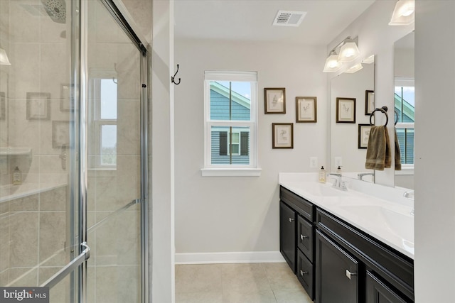 118 Fletcher Cir, Middletown, DE 19709 - full bath with double vanity, a shower stall, tile patterned floors, and baseboards