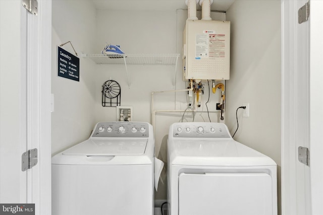118 Fletcher Cir, Middletown, DE 19709 - laundry room with tankless water heater and washer and dryer