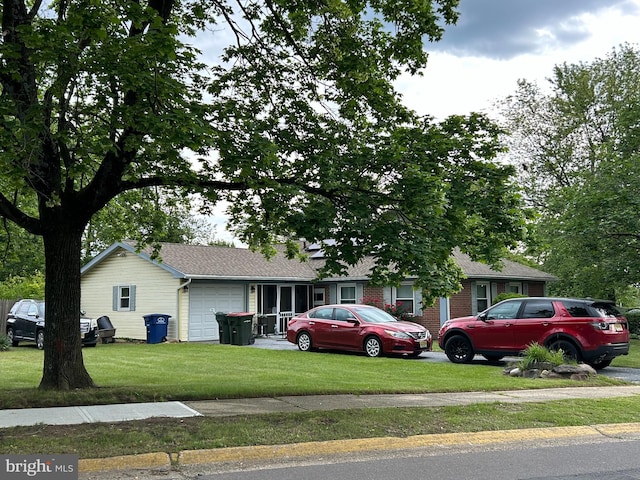 96 Messenger Ln, Willingboro, NJ 08046 - single story home with an attached garage, a front lawn, and a shingled roof