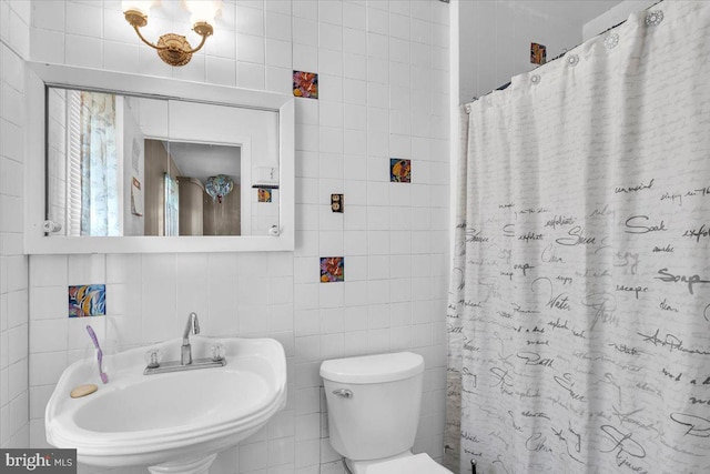 96 Messenger Ln, Willingboro, NJ 08046 - bathroom with tile walls, a sink, toilet, and a shower with curtain