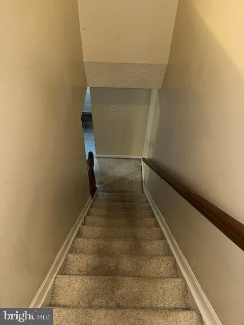 6708 Pauline Ct, Bryans Road, MD 20616 - stairs featuring baseboards