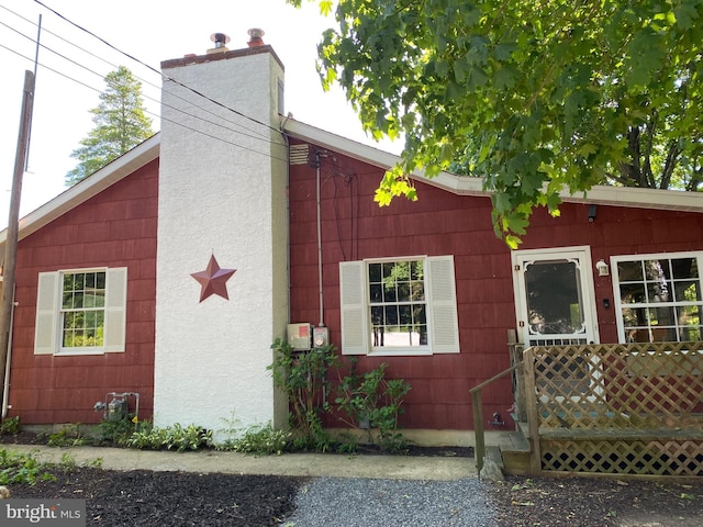 724 Ocean Ave, Galloway, NJ 08205 - view of front of home featuring a chimney