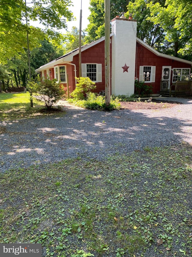 724 Ocean Ave, Galloway, NJ 08205 - view of front of house with a chimney