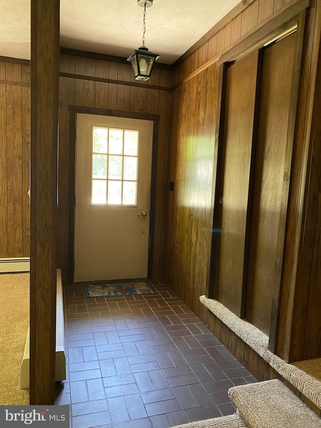 724 Ocean Ave, Galloway, NJ 08205 - doorway to outside featuring wood walls and a baseboard radiator