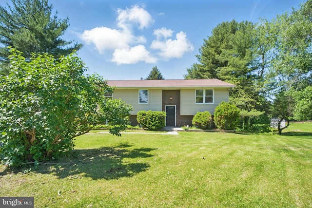 4202 Wolf Ct, Hampstead, MD 21074 - bi-level home with brick siding and a front yard