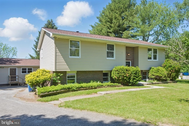 4202 Wolf Ct, Hampstead, MD 21074 - bi-level home with a front yard and brick siding