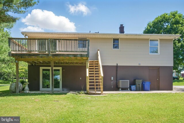 4202 Wolf Ct, Hampstead, MD 21074 - back of house featuring a wooden deck, a lawn, stairway, and cooling unit