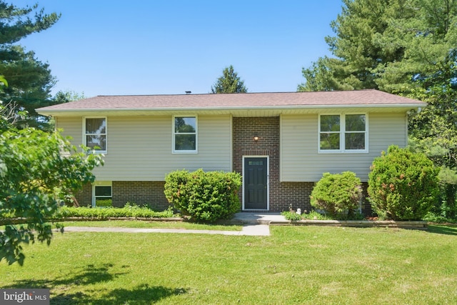 4202 Wolf Ct, Hampstead, MD 21074 - bi-level home with brick siding and a front lawn