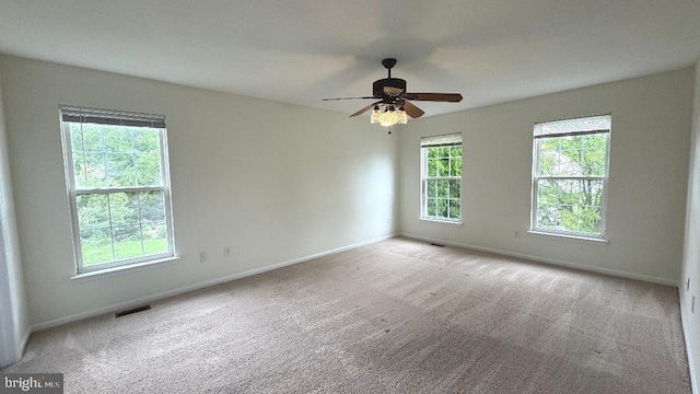 9 Whirlaway Dr, Bear, DE 19701 - carpeted spare room featuring baseboards and a ceiling fan
