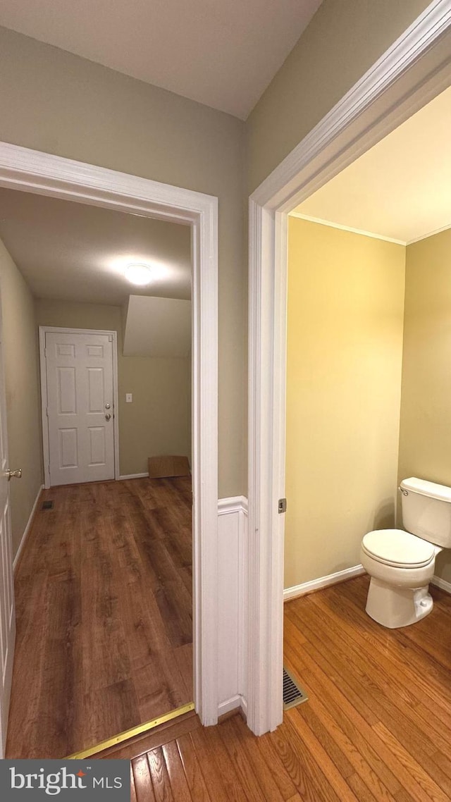 9 Whirlaway Dr, Bear, DE 19701 - hallway featuring wood finished floors and baseboards