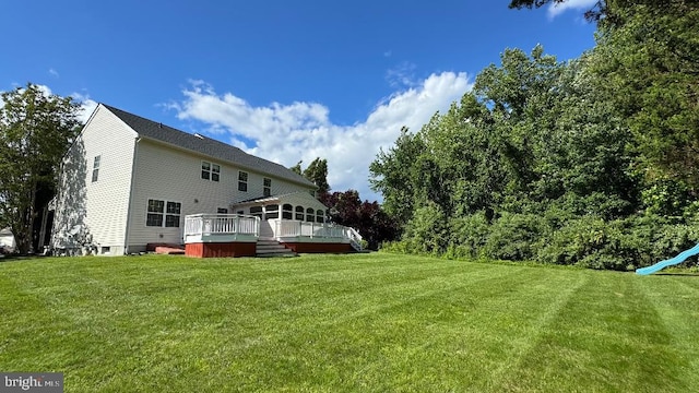 9 Whirlaway Dr, Bear, DE 19701 - view of grassy yard featuring a wooden deck