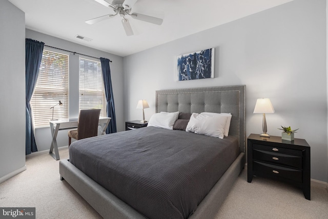 2665 Prosperity Ave Unit 109, Fairfax, VA 22031 - bedroom with light carpet, baseboards, and a ceiling fan