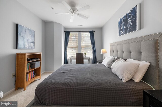 2665 Prosperity Ave Unit 109, Fairfax, VA 22031 - bedroom with light carpet, baseboards, and a ceiling fan