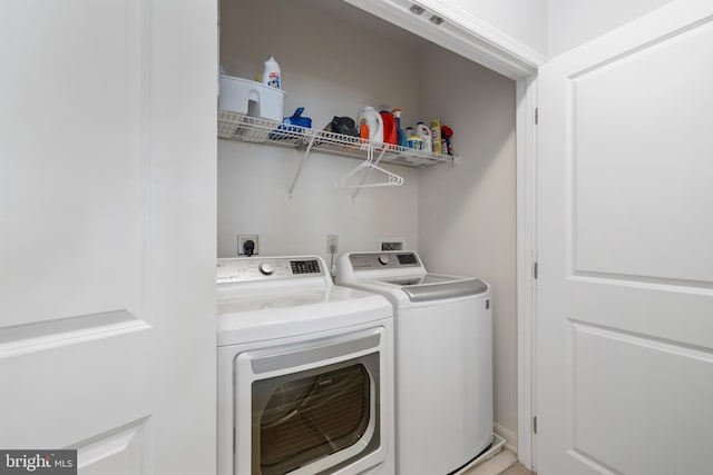 2665 Prosperity Ave Unit 109, Fairfax, VA 22031 - laundry room featuring washer and clothes dryer