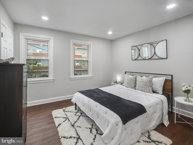 5623 Eads St NE, Washington, DC 20019 - bedroom with dark wood finished floors, baseboards, and recessed lighting