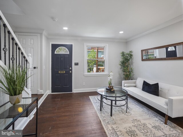 5623 Eads St NE, Washington, DC 20019 - living area featuring wood finished floors, stairs, baseboards, ornamental molding, and recessed lighting