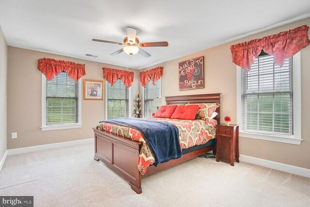 4904 Charmed Ct, Woodbridge, VA 22192 - carpeted bedroom featuring baseboards and ceiling fan